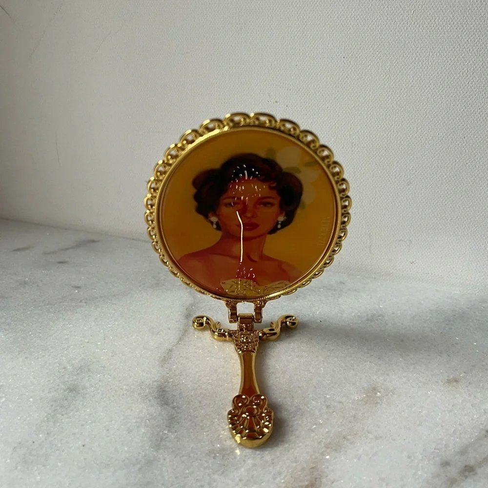 Izzy and Liv gold Fold Away Hand Mirror adjustable